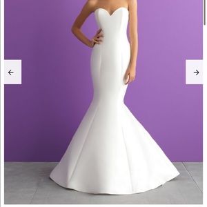 Never worn/unaltered Ivory Allure 3000 size 16